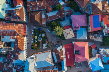 Photo of brightly coloured rooftops from above